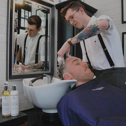 Cleansing hairwash and scalp massage