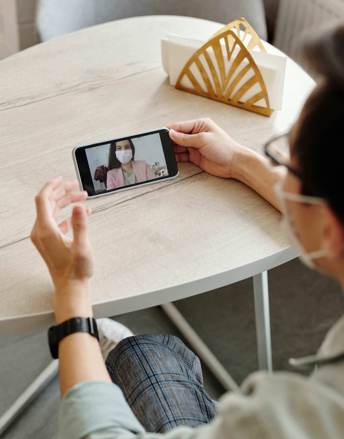 Patient on a video call with a doctor