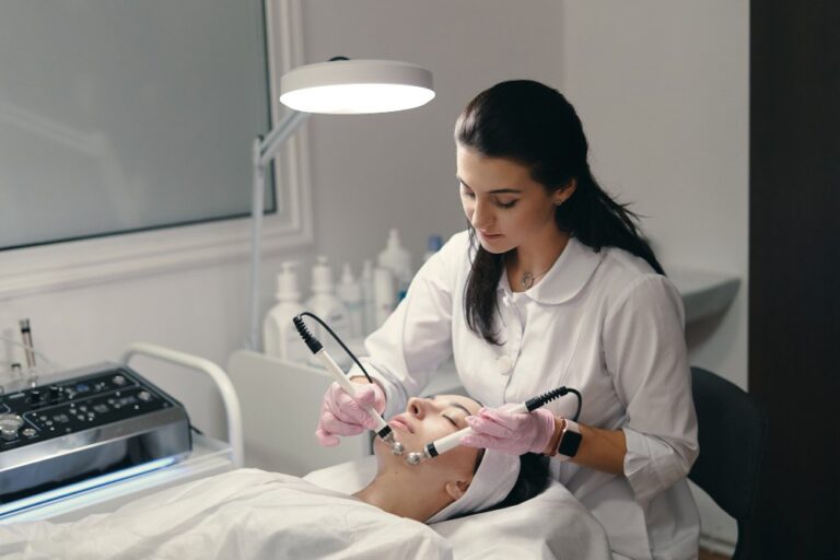 Dermatologist examining a patient’s skin