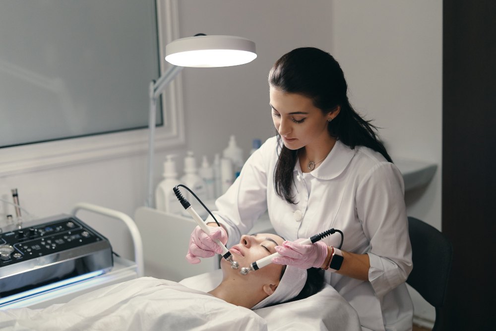 Dermatologist examining a patient’s skin