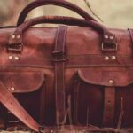 Brown leather duffel bag