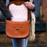 Tan leather saddle bag