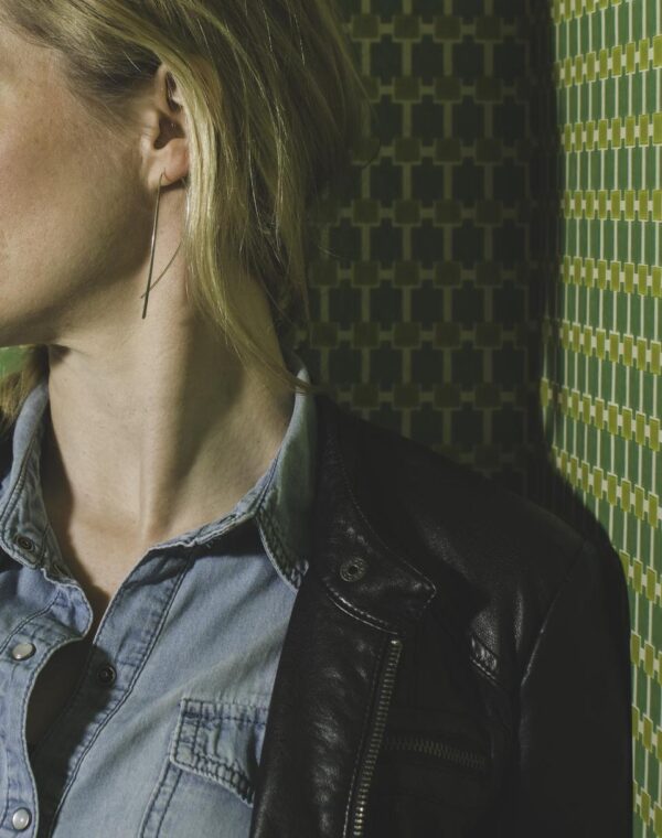 Woman in a denim collared shirt