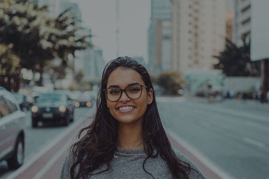 Portrait of a smiling parent outdoors