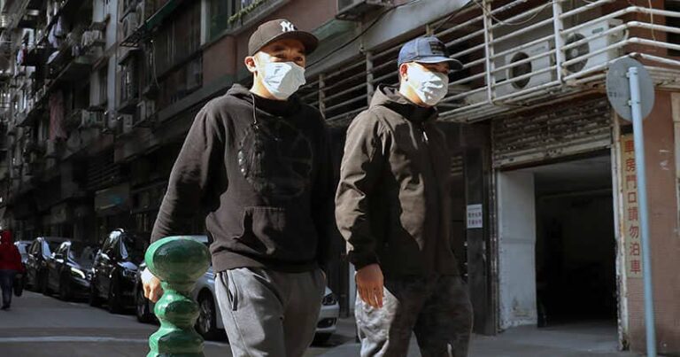 Walking outside wearing a face mask