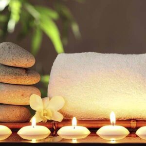 Hands receiving a nourishing treatment