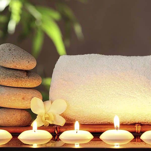 Hands receiving a nourishing treatment
